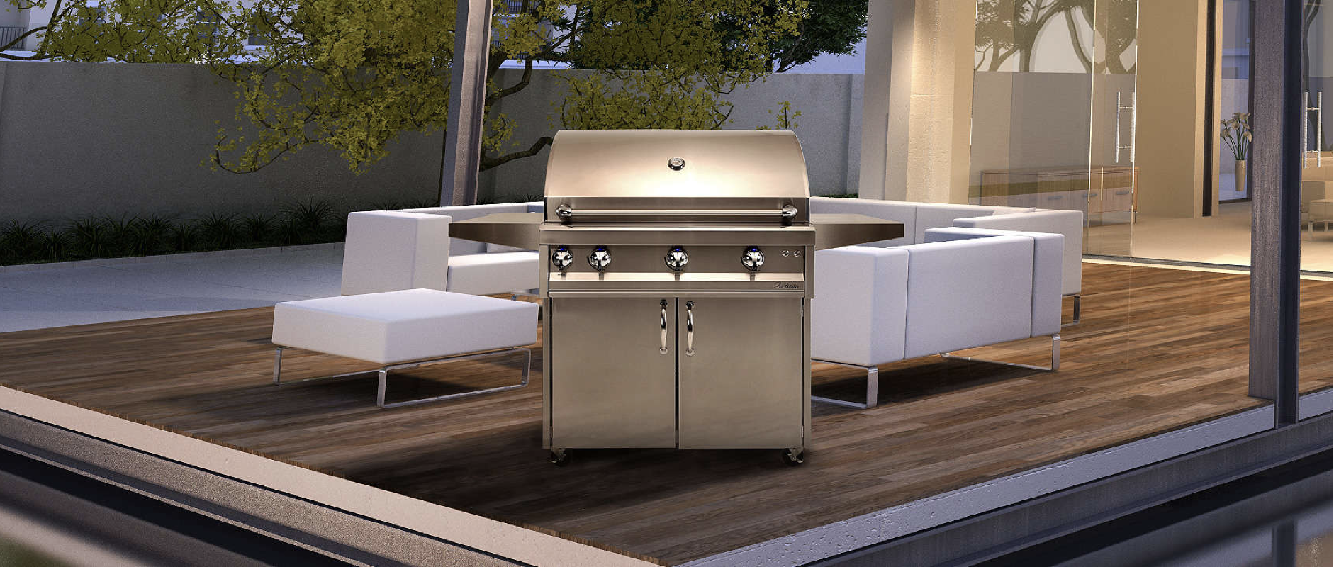 a freestanding stainless steel grill on a modern outdoor patio next to a white couch and chair and ottoman